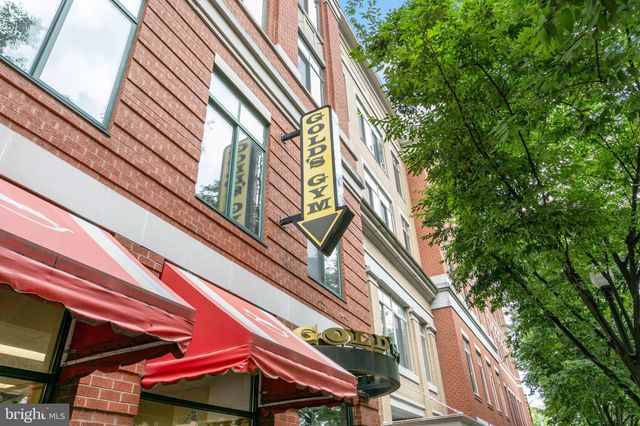 a view of a building with a street