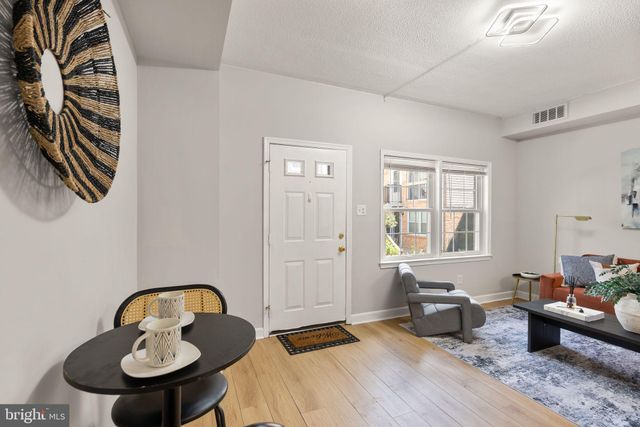 a room with furniture or couch and a window