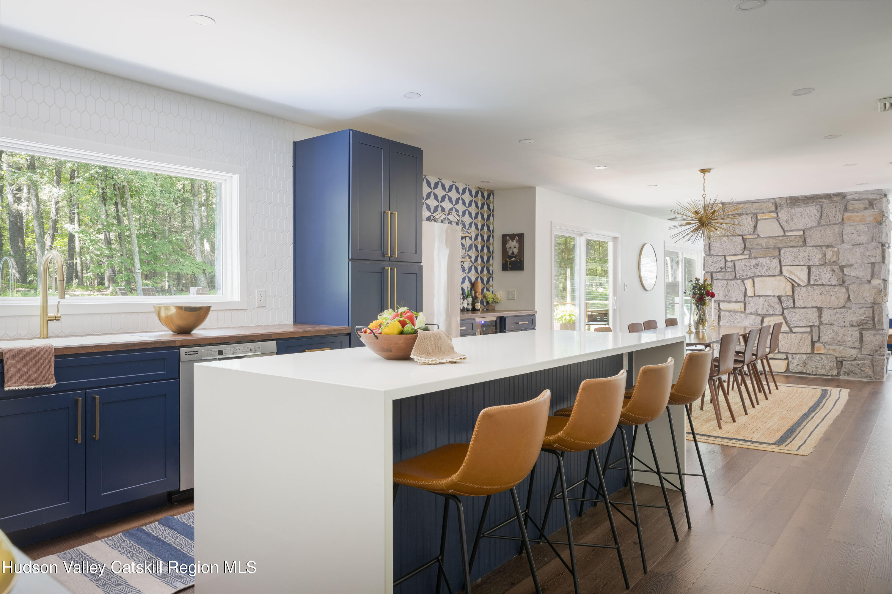 63 Lapla Road Kingston, NY 12401 - Photo 17 of 42 a dining hall with stainless steel appliances granite countertop a dining table and chairs
