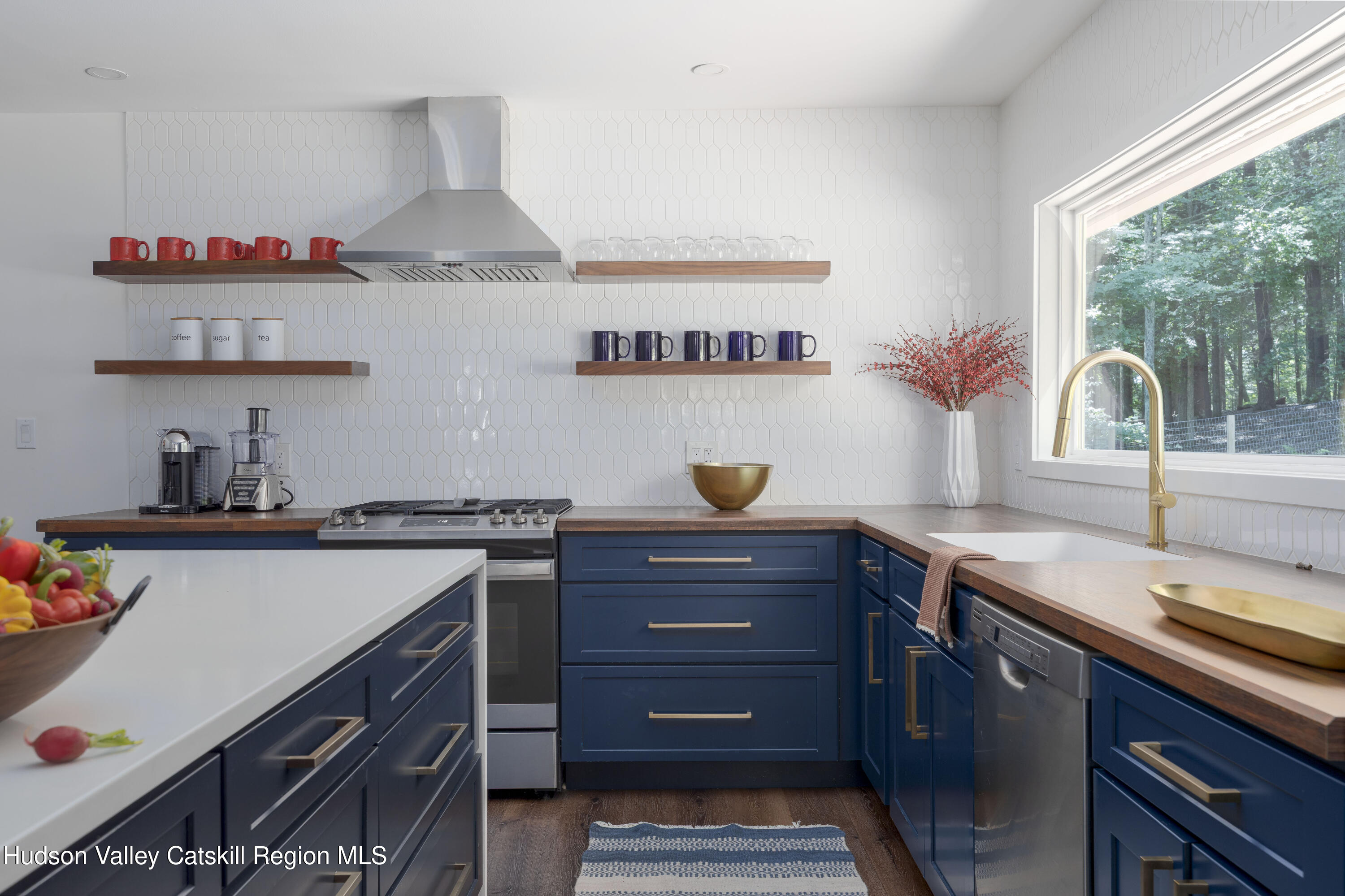63 Lapla Road Kingston, NY 12401 - Photo 19 of 42 a kitchen with a sink a stove and cabinets