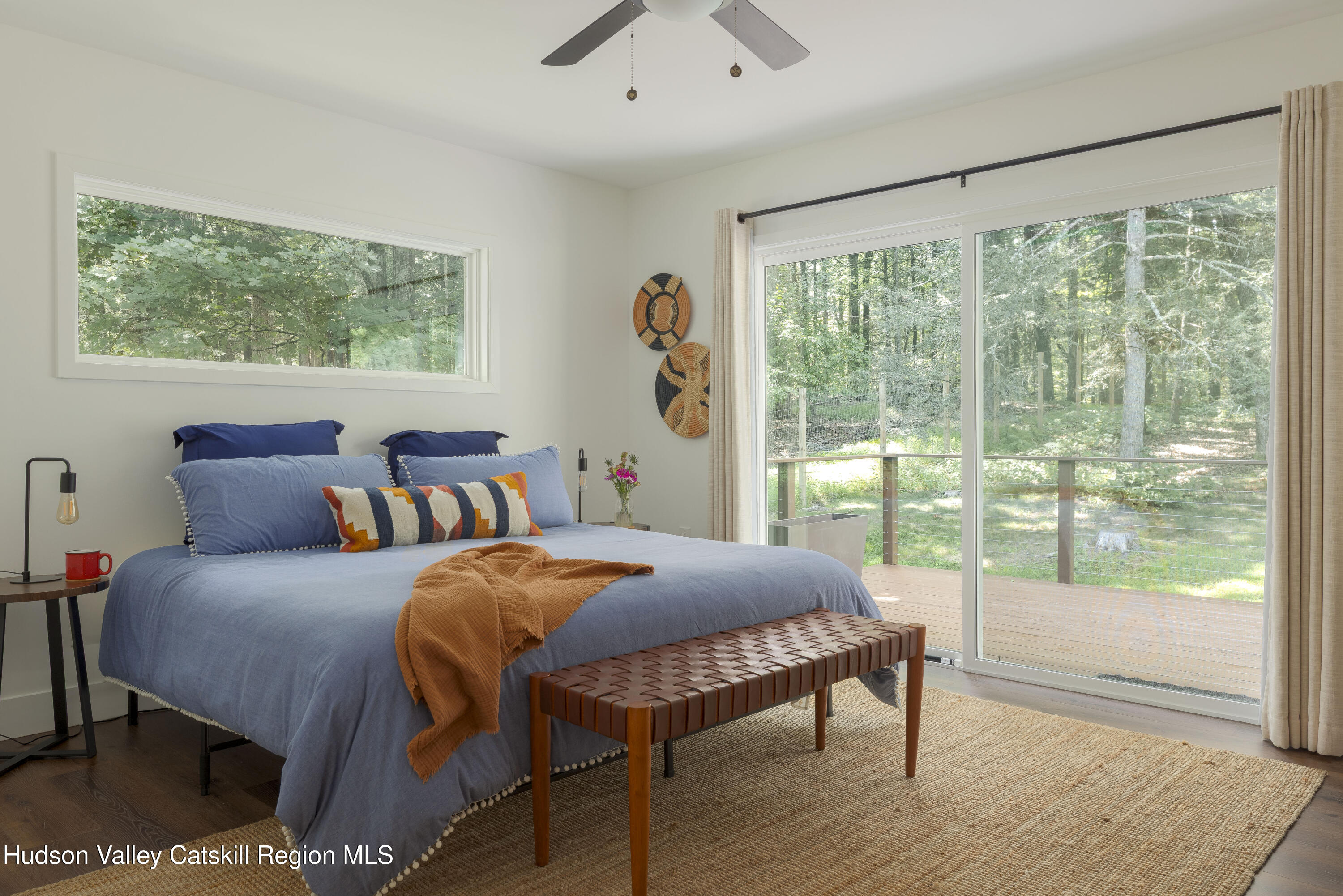 63 Lapla Road Kingston, NY 12401 - Photo 23 of 42 a bedroom with a bed and a large window