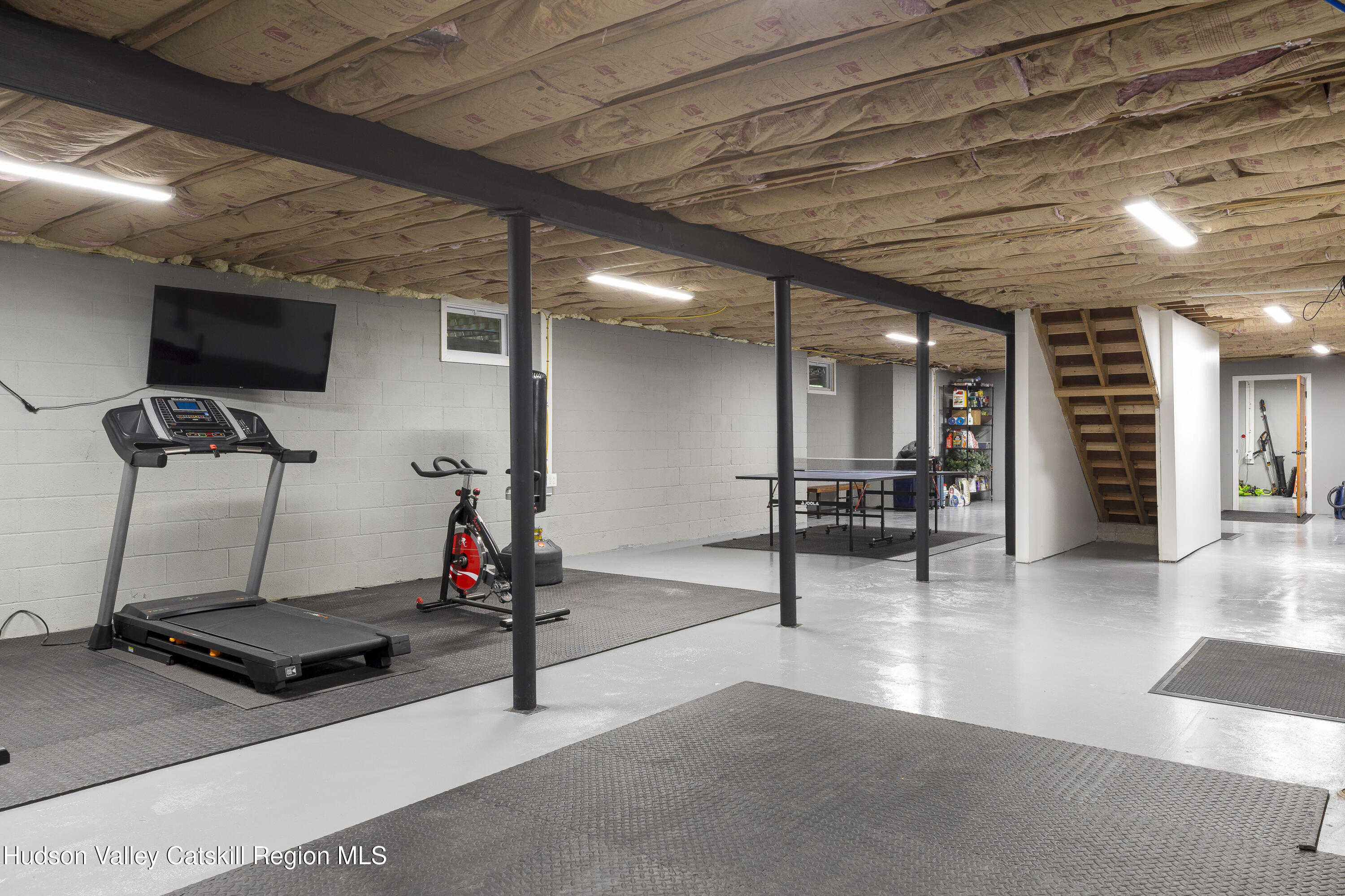 63 Lapla Road Kingston, NY 12401 - Photo 31 of 42 a view of a room with gym equipment