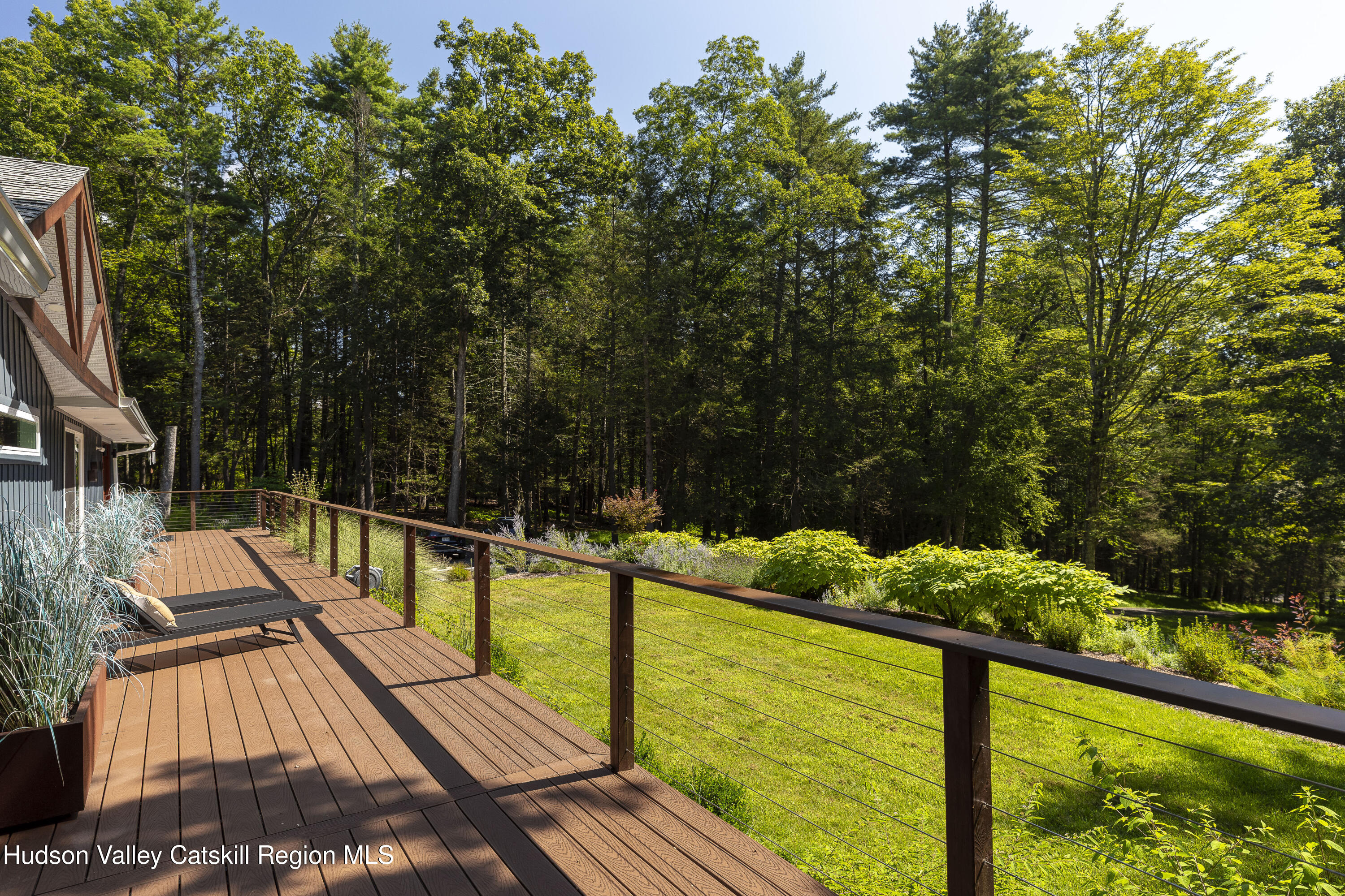 63 Lapla Road Kingston, NY 12401 - Photo 36 of 42 a view of a swimming pool with a patio and fire pit