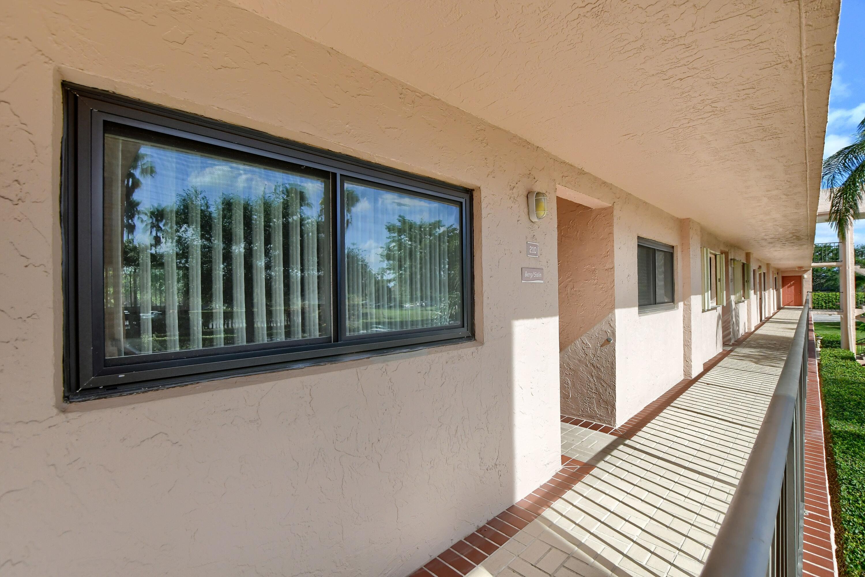 15075 Witney Road, Unit 210 Delray Beach, FL 33484 - Photo 2 of 27 02_ebf_2630-hdr(5)
