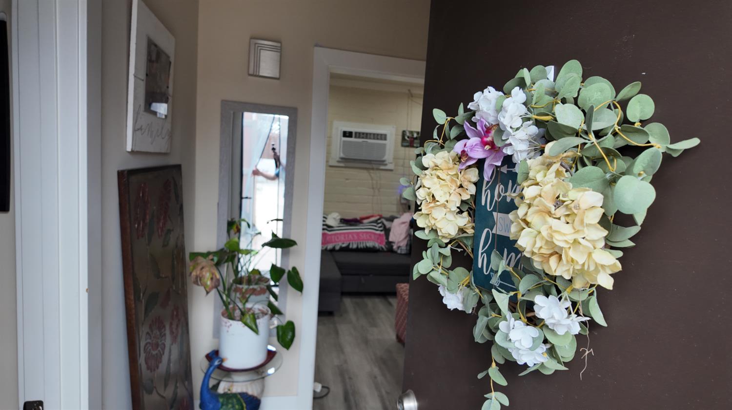 129 Phoenix Avenue Modesto, CA 95354 - Photo 19 of 21 a vase of flowers with wooden floor