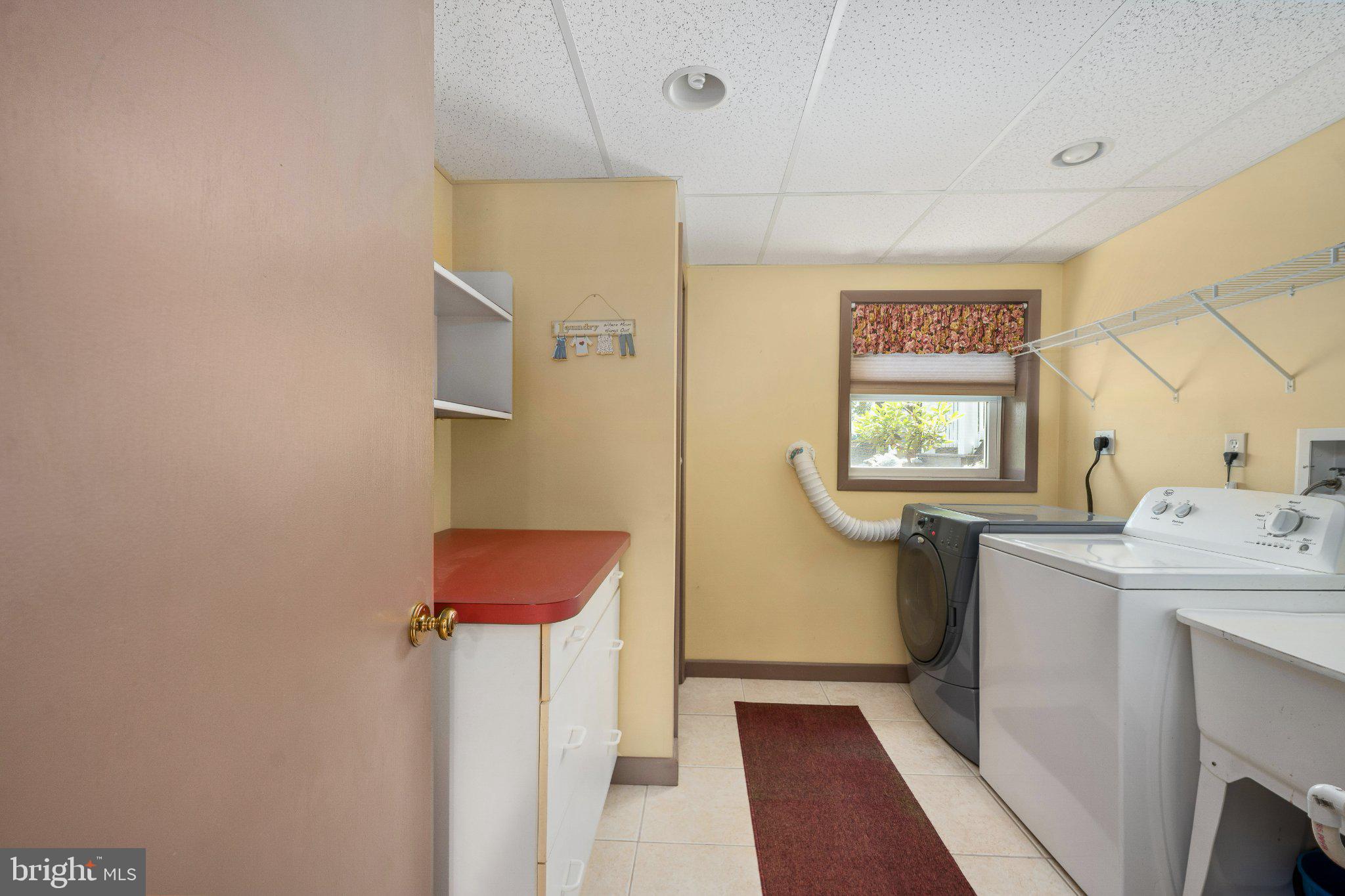 279 Harbor Drive Reedville, VA 22539 - Photo 54 of 97 Large laundry and utility space.
