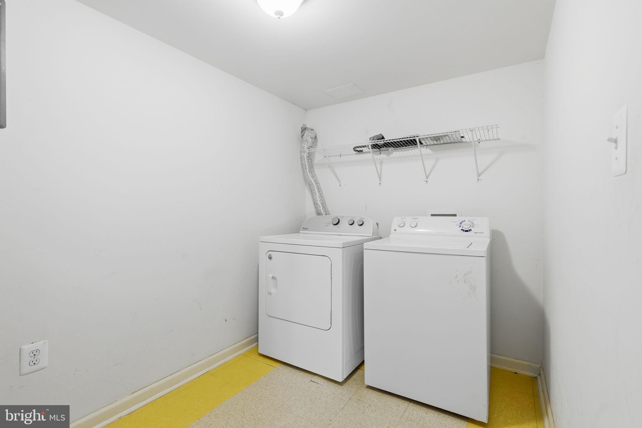9013 Volta Street Lanham, MD 20706 - Photo 30 of 31 a utility room with dryer and washer