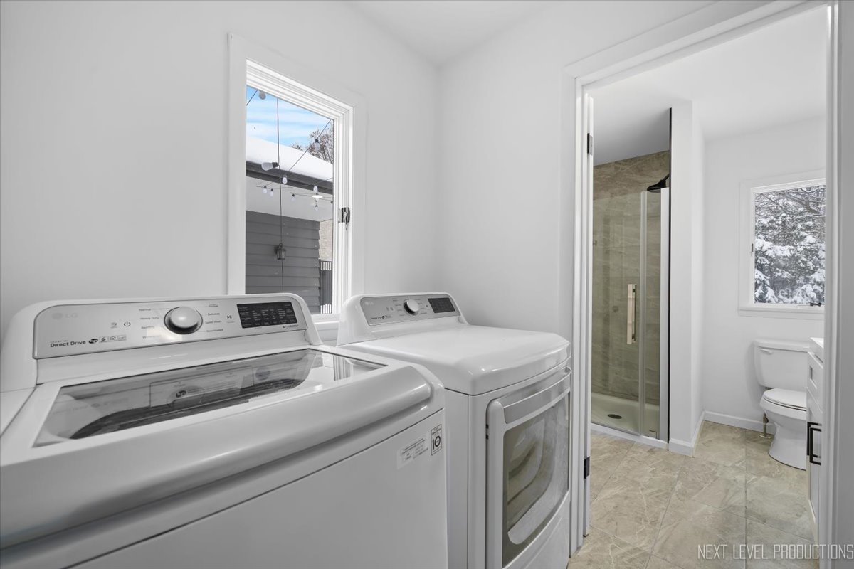 1017 South 6th Street St. Charles, IL 60174 - Photo 18 of 30 a utility room with dryer and washer