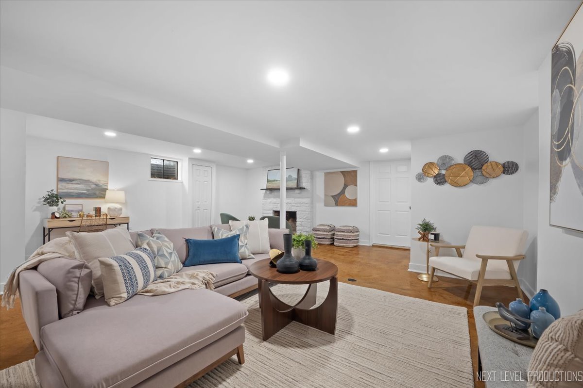 1017 South 6th Street St. Charles, IL 60174 - Photo 20 of 30 a living room with furniture and a wooden floor