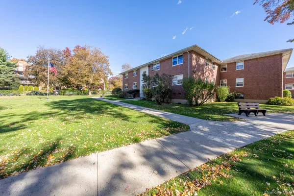 a house with garden in front of it