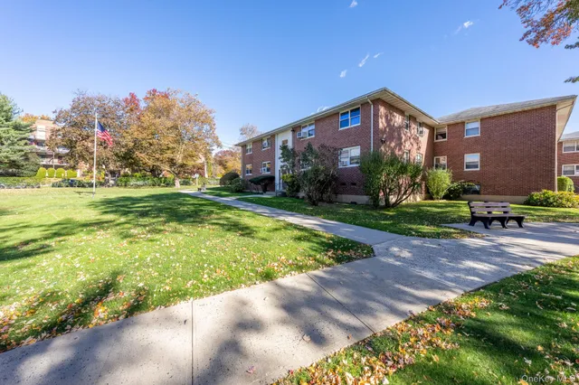 a house with garden in front of it