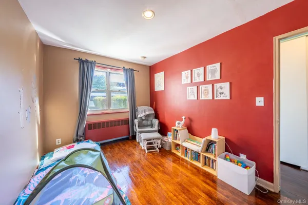 a room with furniture and a window