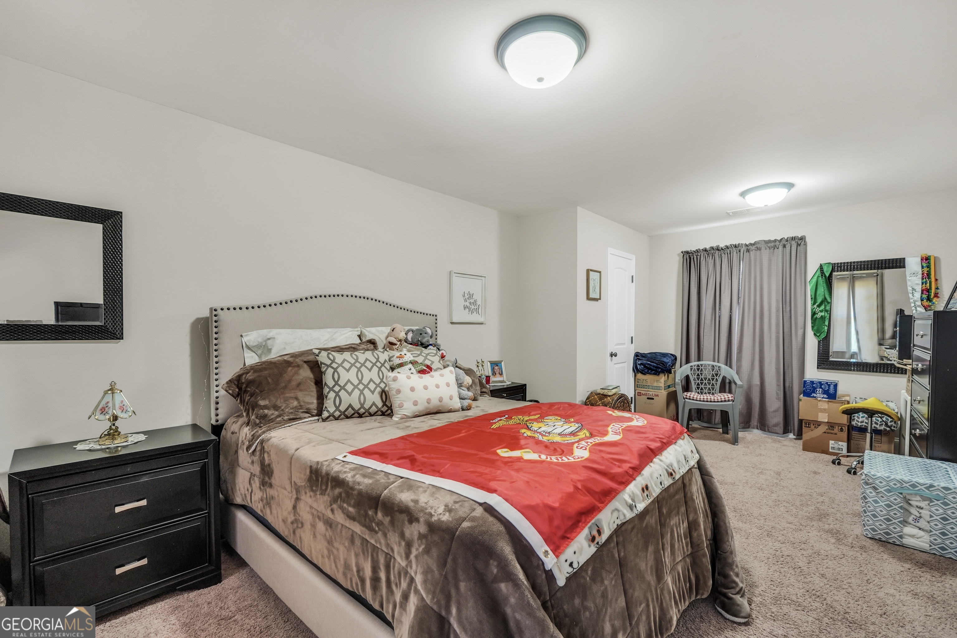 185 Wynn Road McDonough, GA 30252 - Photo 17 of 36 a bedroom with bed and chair