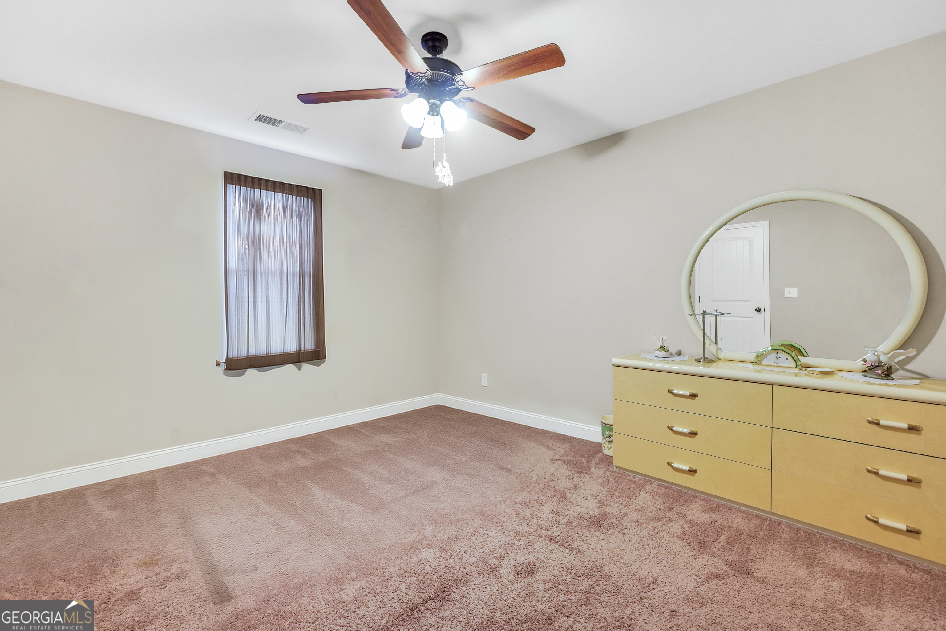 185 Wynn Road McDonough, GA 30252 - Photo 26 of 36 an empty room with windows