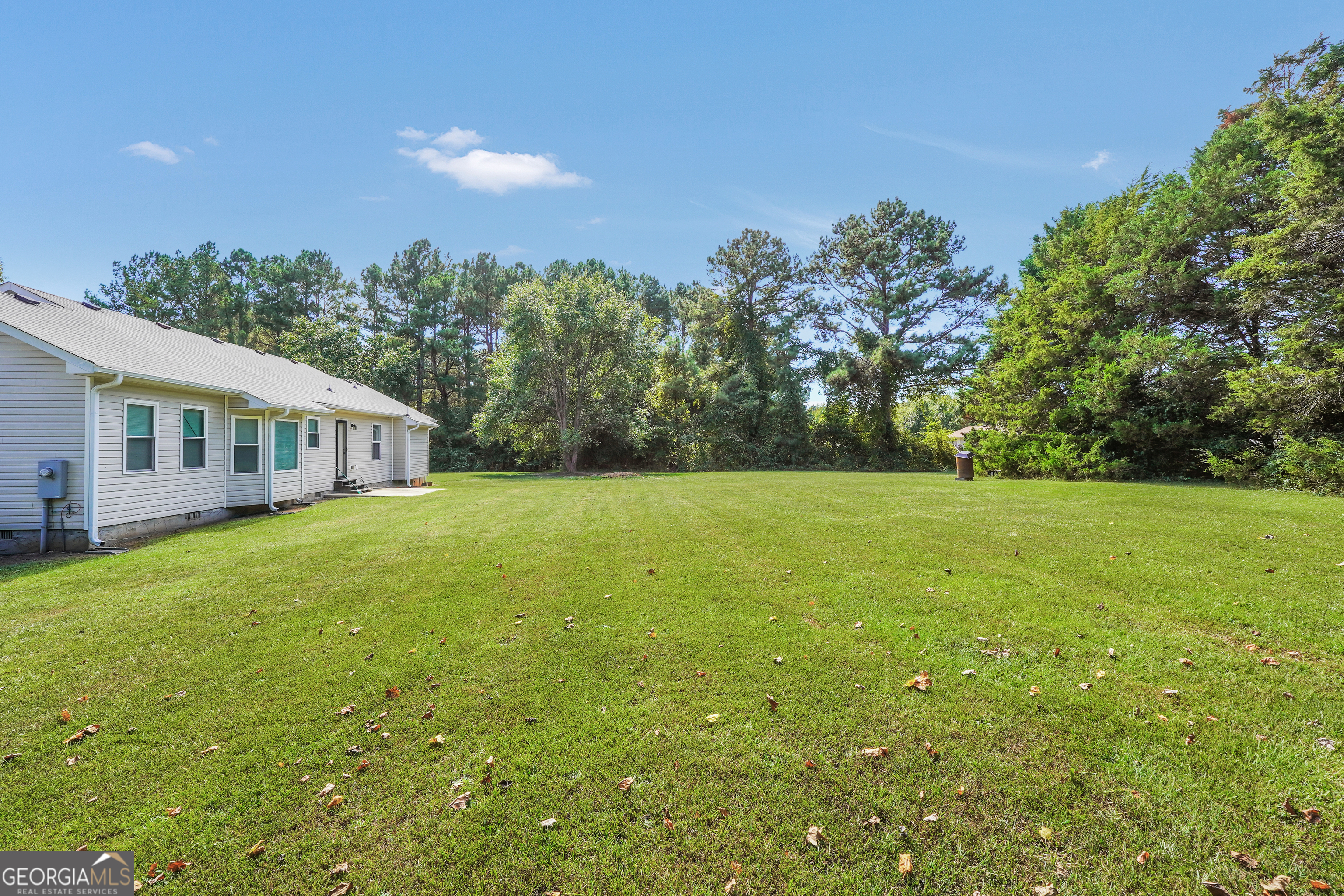 185 Wynn Road McDonough, GA 30252 - Photo 30 of 36 a outdoor space with green field and trees