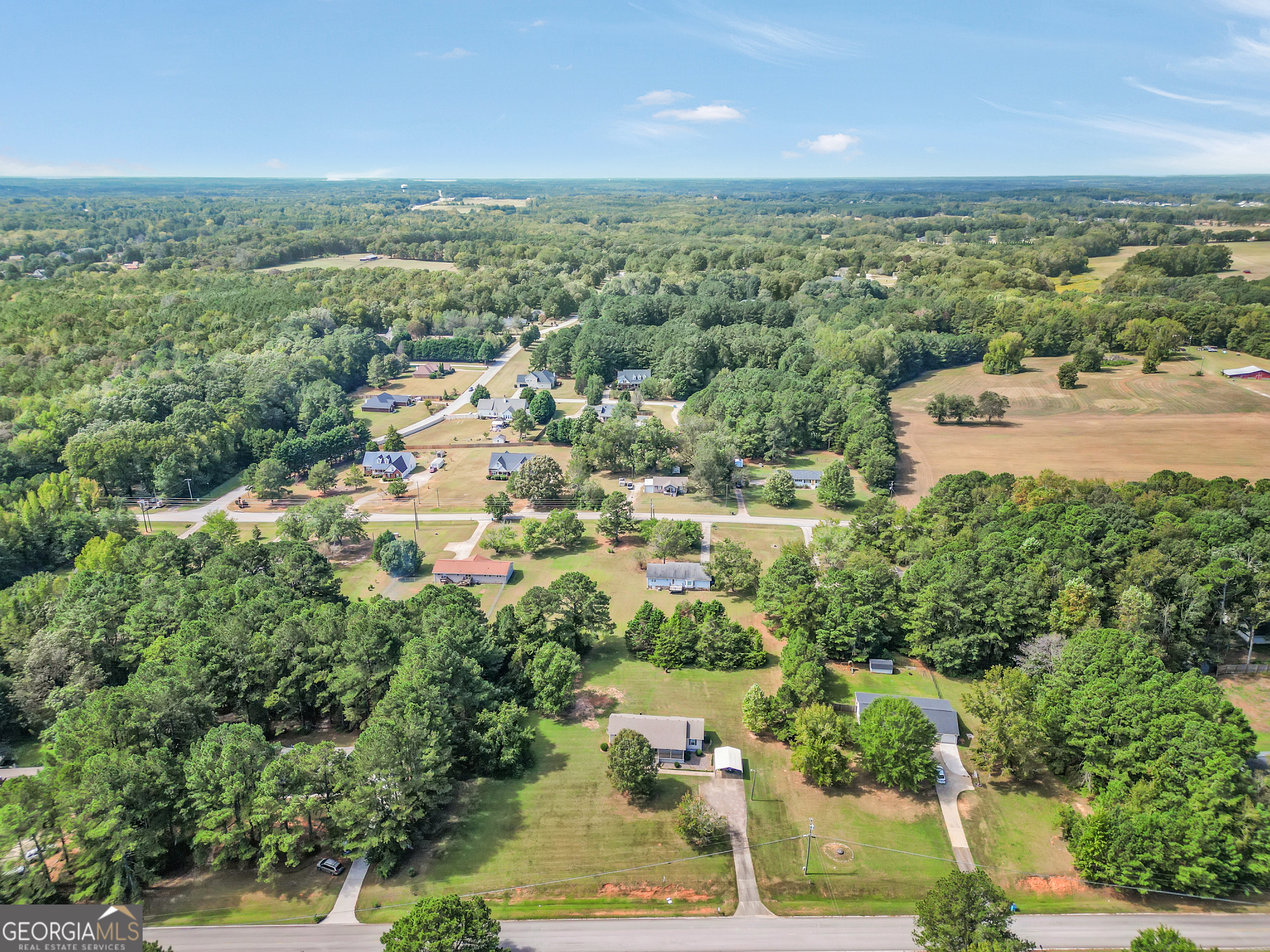 185 Wynn Road McDonough, GA 30252 - Photo 36 of 36 an aerial view of residential houses with outdoor space and trees