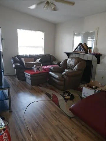 a kitchen with a stove top oven and cabinets