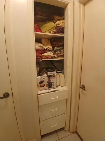 a kitchen with stainless steel appliances granite countertop a stove and a refrigerator