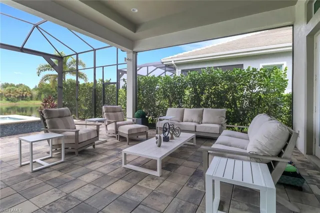 a outdoor living space with furniture and garden view