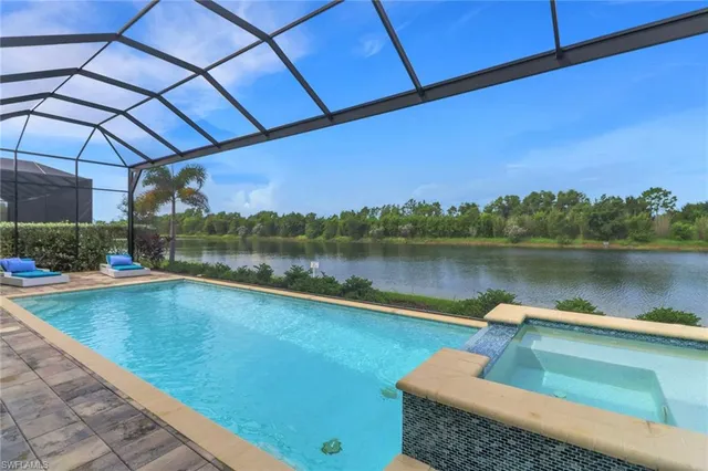 a view of a swimming pool with a patio