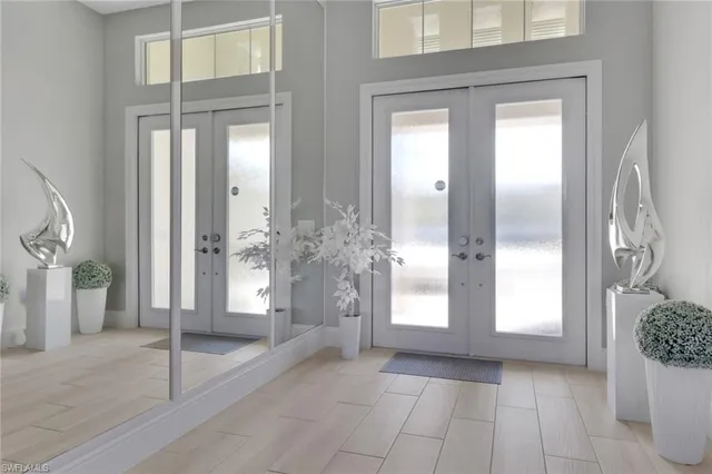 a view of a bathroom with a glass door and a window
