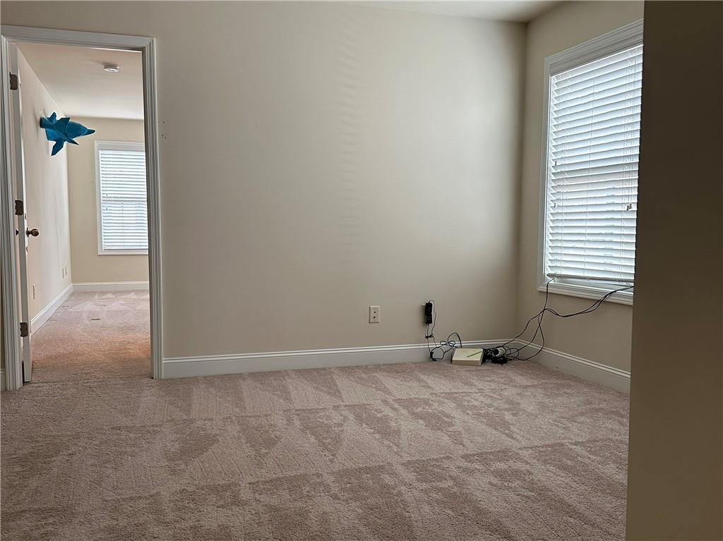 4334 Bellview Lane Duluth, GA 30097 - Photo 12 of 27 an empty room with a window