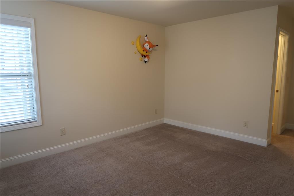 4334 Bellview Lane Duluth, GA 30097 - Photo 19 of 27 an empty room with a window