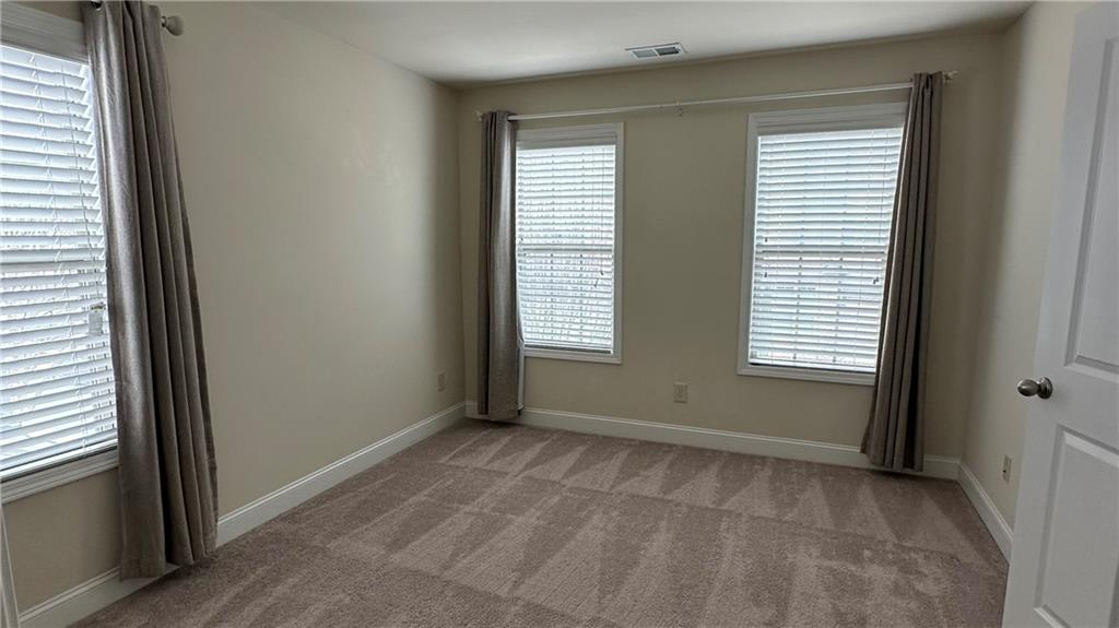 4334 Bellview Lane Duluth, GA 30097 - Photo 22 of 27 a view of an empty room with a window