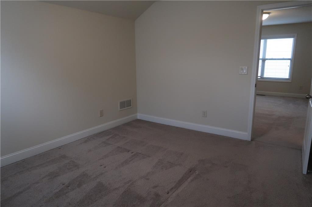 4334 Bellview Lane Duluth, GA 30097 - Photo 25 of 27 an empty room with a window