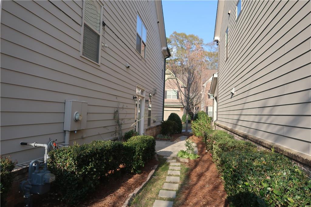 4334 Bellview Lane Duluth, GA 30097 - Photo 3 of 27 a view of a house with a backyard