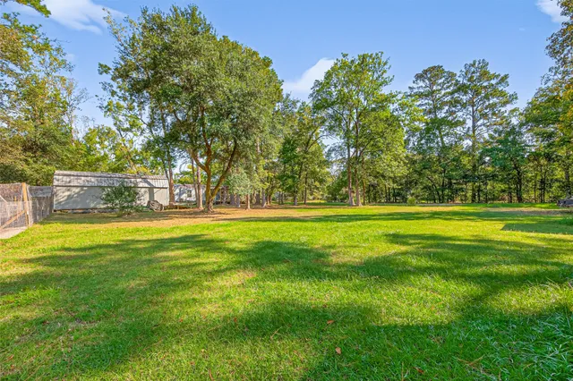 a view of outdoor space with deck and garden