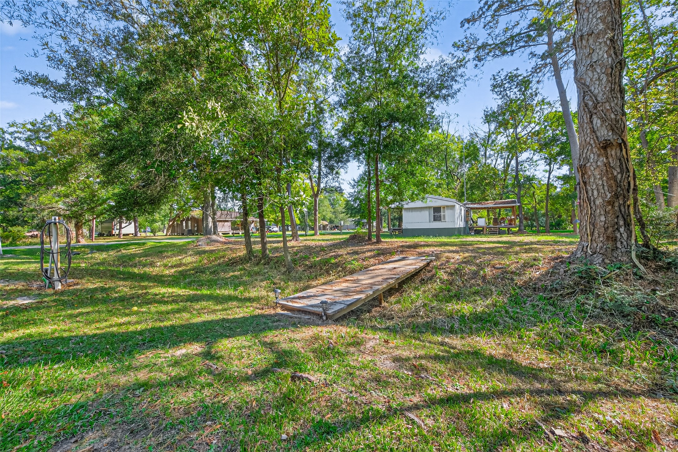 14 County Road 2400 Hull, TX 77564 - Photo 32 of 38 a view of a park with large trees