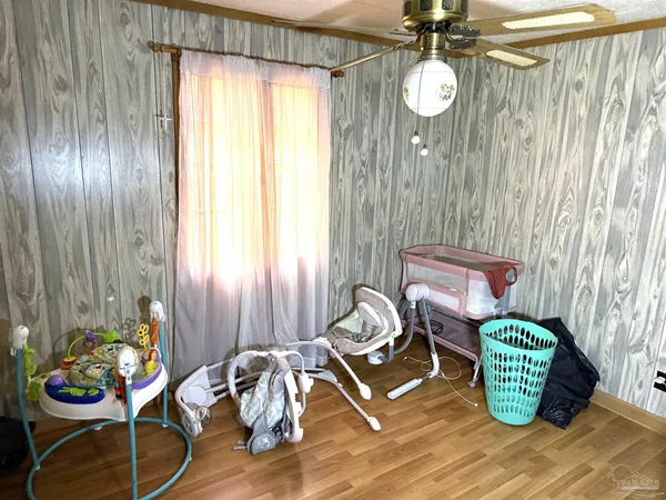 a living room with furniture and decor