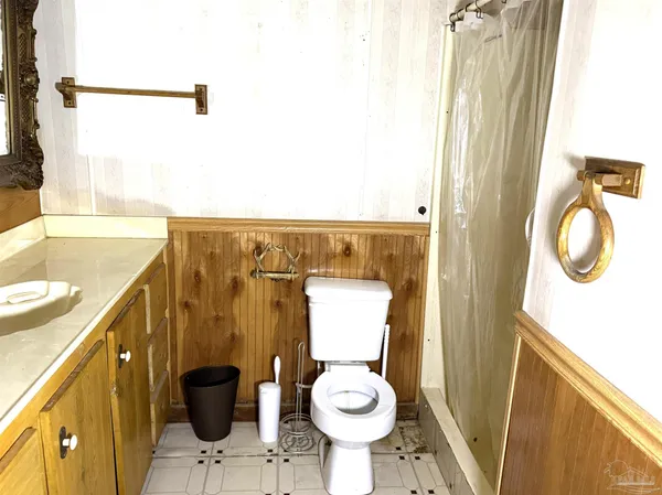 a bathroom with a sink and toilet