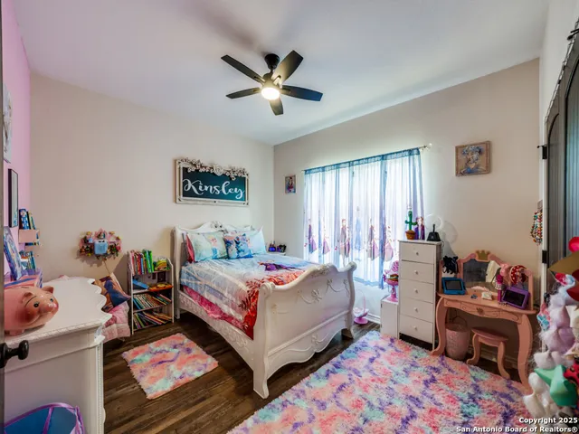 a bed room with a bed and a window