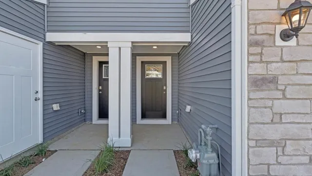 a view of a entryway door front of house