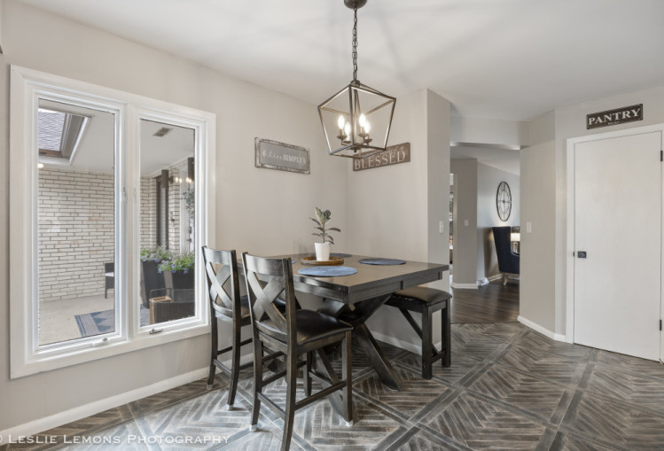 707 South Finley Road Lombard, IL 60148 - Photo 15 of 25 a view of a dining room with furniture window and wooden floor
