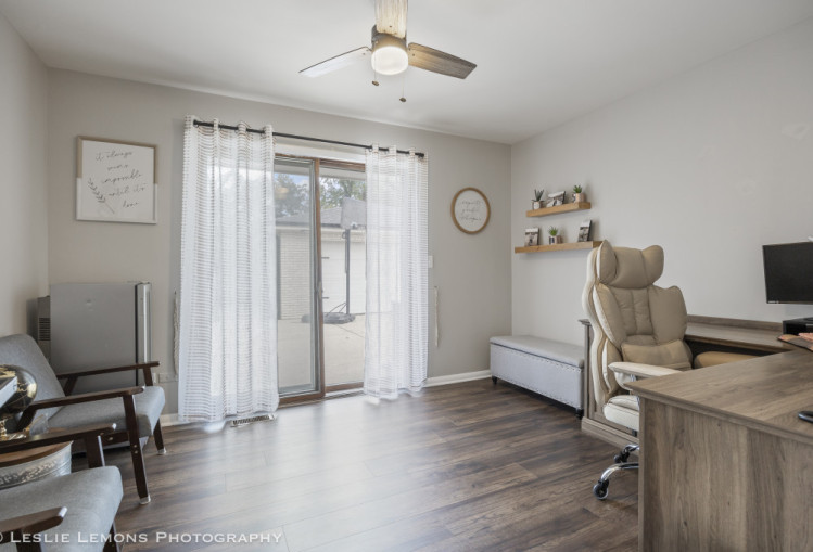 707 South Finley Road Lombard, IL 60148 - Photo 17 of 25 a view of a workspace with furniture and a window