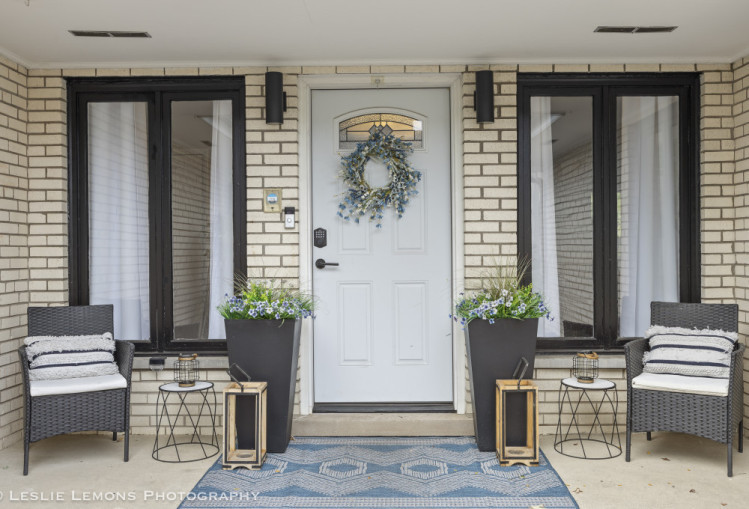 707 South Finley Road Lombard, IL 60148 - Photo 2 of 25 a front view of a house with outdoor seating