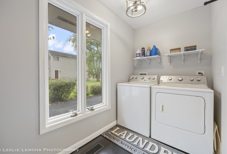 707 South Finley Road Lombard, IL 60148 - Photo 21 of 25 a utility room with dryer and washer
