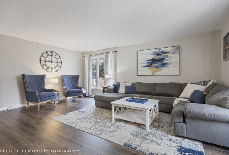 707 South Finley Road Lombard, IL 60148 - Photo 6 of 25 a living room with furniture wooden floor and a window