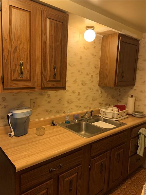 255 Southern Avenue Pittsburgh, PA 15211 - Photo 14 of 25 a bathroom with a sink and a mirror