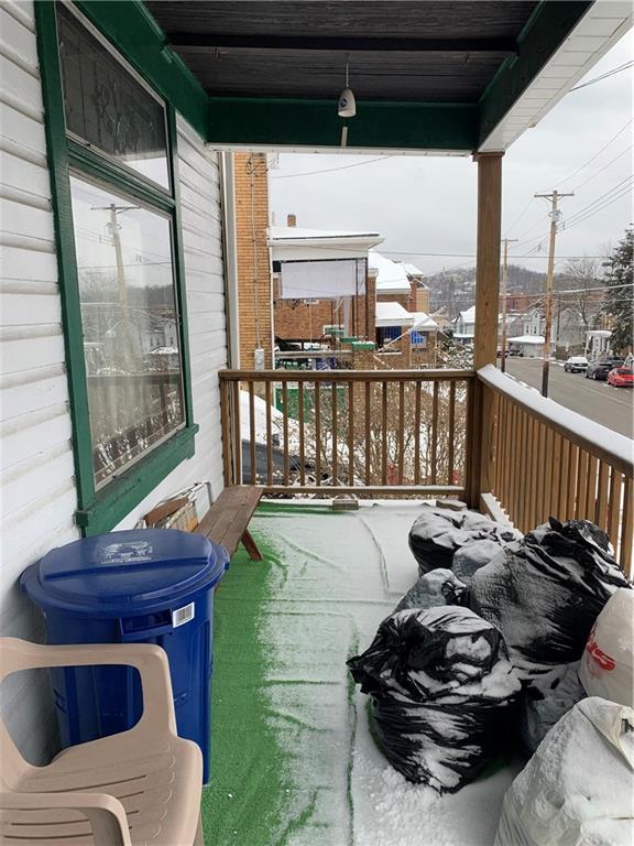 255 Southern Avenue Pittsburgh, PA 15211 - Photo 23 of 25 a balcony with furniture and a potted plant