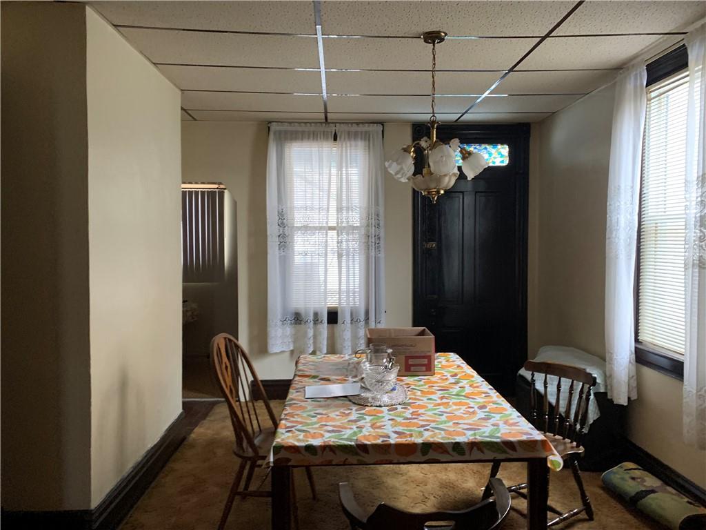255 Southern Avenue Pittsburgh, PA 15211 - Photo 5 of 25 a view of a dining room with furniture window and wooden floor