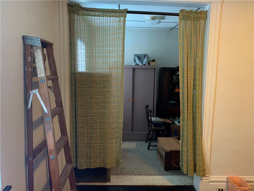 255 Southern Avenue Pittsburgh, PA 15211 - Photo 10 of 25 a bathroom with a sink and a mirror