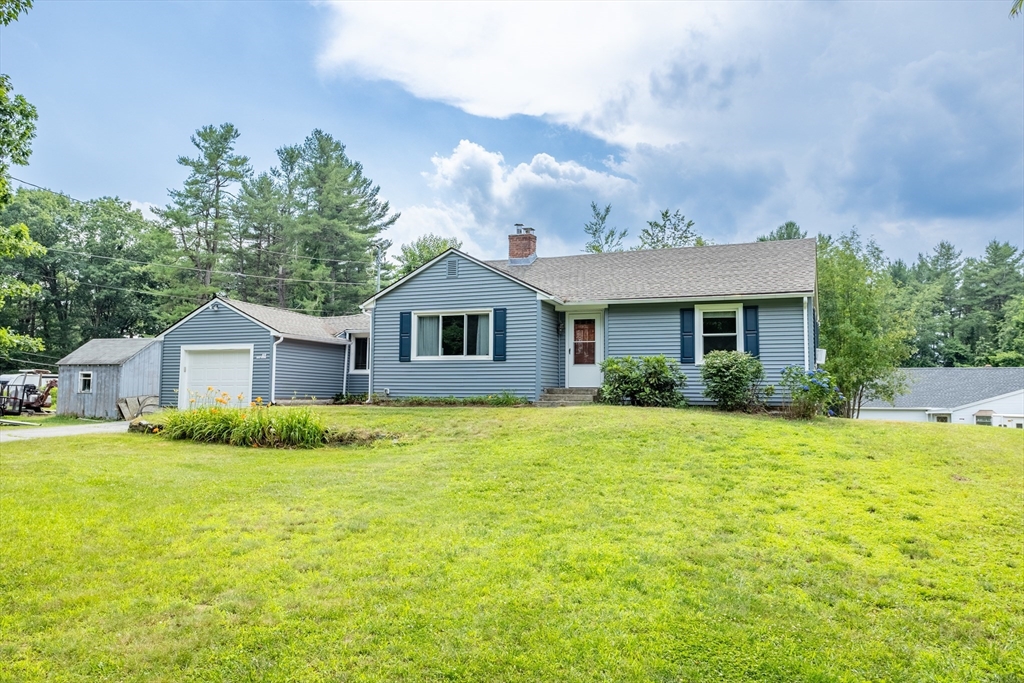69 East Road Westminster, MA 01473 - Photo 1 of 17 a front view of a house with a garden