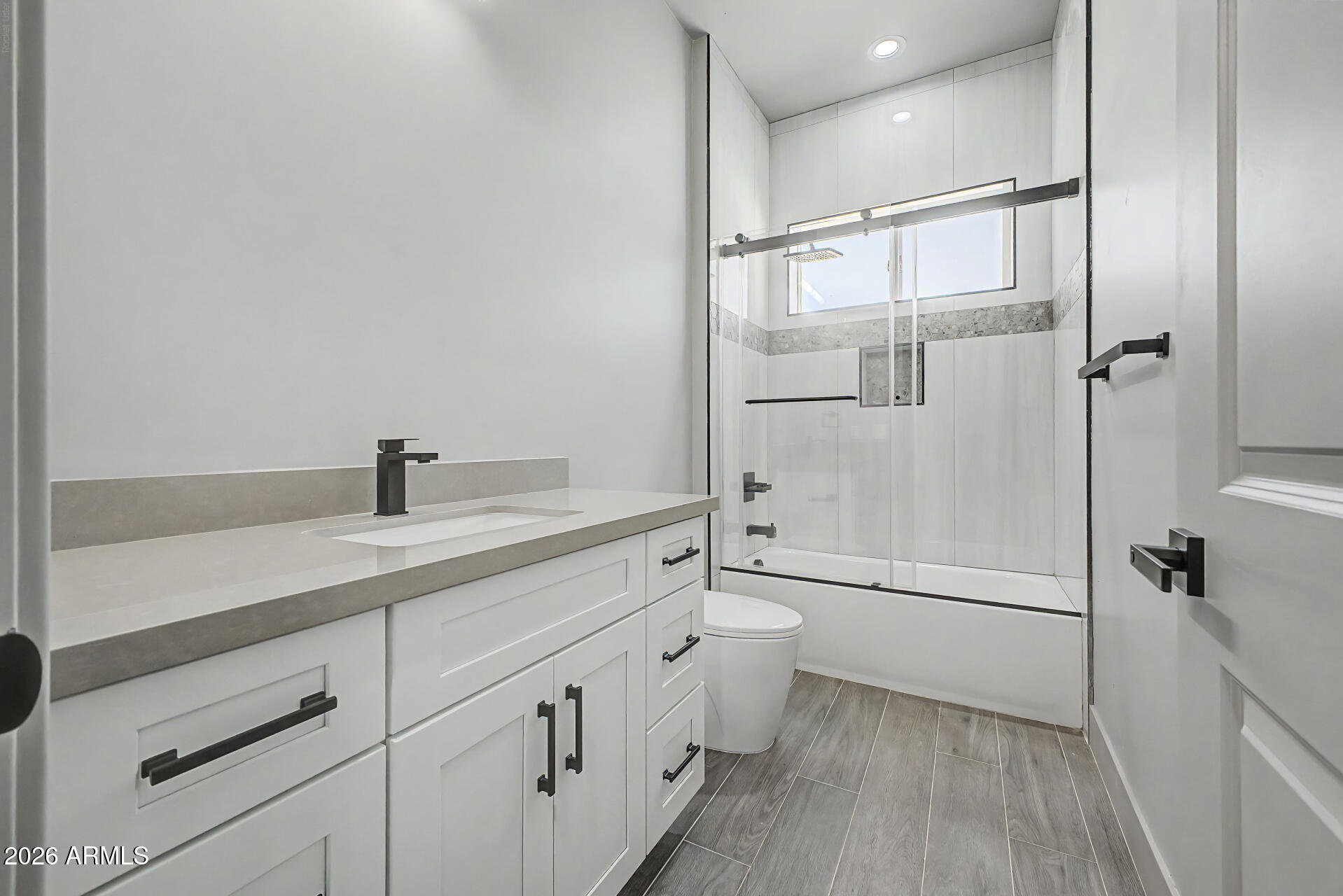 40461 West Robles Road Stanfield, AZ 85172 - Photo 45 of 54 a bathroom with a double vanity sink toilet and shower