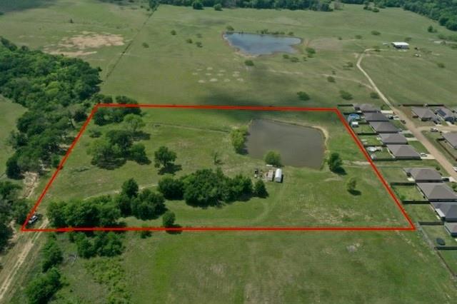 600 Barnes Mabank, TX 75147 - Photo 1 of 10 an aerial view of a golf course with a yard