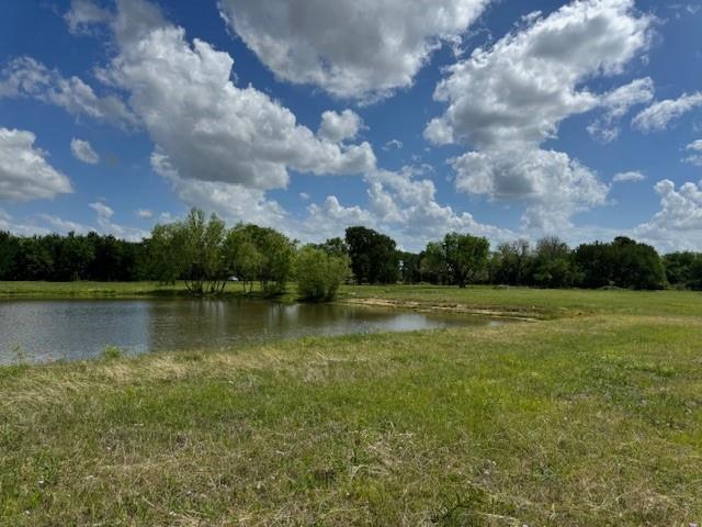 600 Barnes Mabank, TX 75147 - Photo 5 of 10 a view of a lake with houses in the back