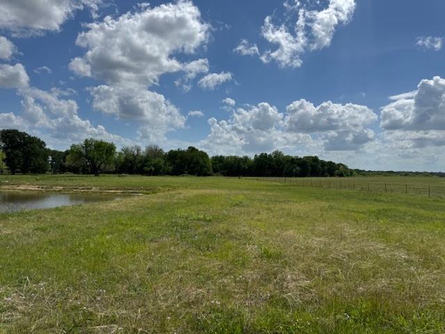 600 Barnes Mabank, TX 75147 - Photo 6 of 10 a view of a lake with a big yard